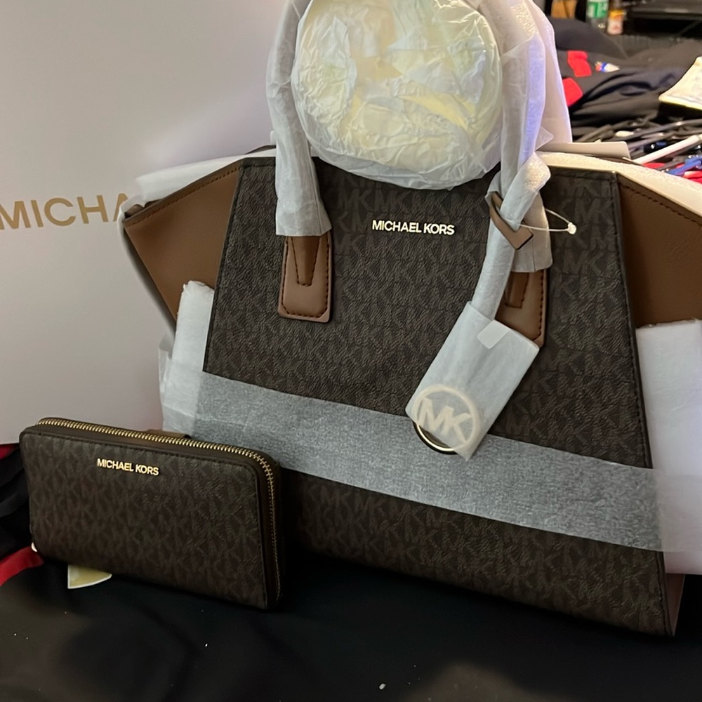Jet set brand new with tags satchel and matching wallet! Comes with strap!